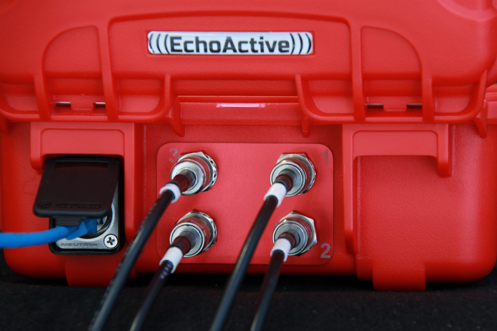 Four UHF antenna cables and an ethernet lead plugged into the back of an EchoActive Plus